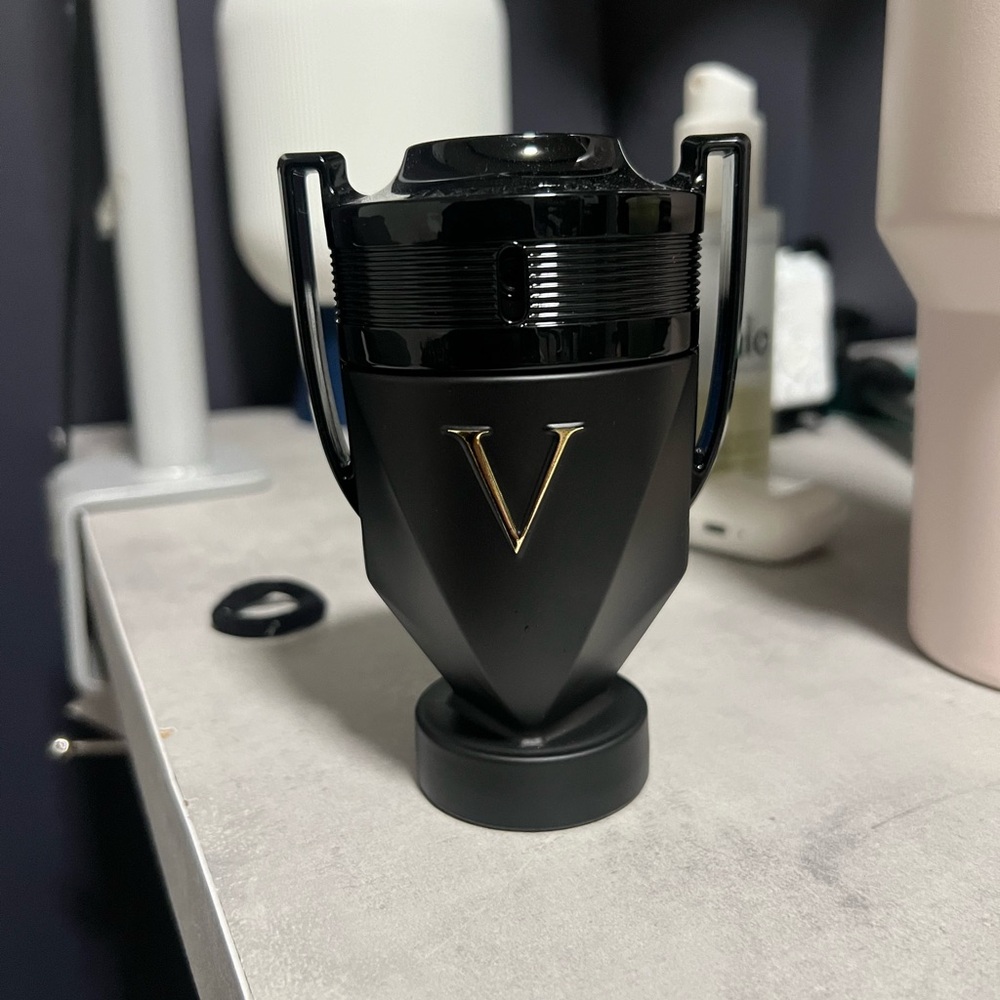 Paco Rabanne Black and Gold Trophy Bottle